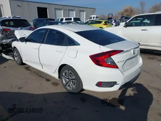 2016 Honda Civic Sedan LX with VIN 2HGFC2F58GH515190, listed as a IAAI auction lot 41017534 with 135,389 mi miles. Bid and sale history available at carsss.com. Image 3.