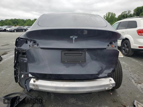2024 Tesla Model Y z VIN 7SAYGDED5RF018979, wystawiony jako Copart lot #55651195 z przebiegiem 10 488 mil mil oraz Czysty tytuł • Clean title. Historia ofert i sprzedaży dostępna na DreamBid. Obrazek 6.