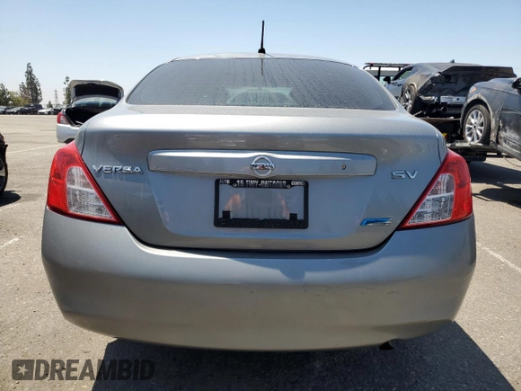 2012 Nissan Versa SV with VIN 3N1CN7AP8CL818508, listed as a Copart auction lot 63164515 with 94,455 mi miles and Salvage title. Bid and sale history available at DreamBid. Image 6.