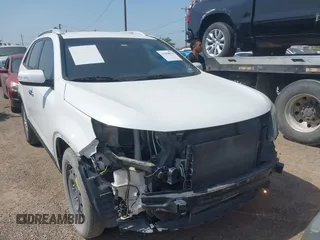 2015 Kia Sorento LX with VIN 5XYKT4A65FG659155, listed as a IAAI auction lot 41968018 with 138,704 mi miles. Bid and sale history available at carsss.com. Image 1.