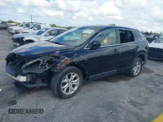2012 Mazda CX-9 Touring with VIN JM3TB3CV1C0338681, listed as a IAAI auction lot 40458498 with 128,665 mi miles and . Bid and sale history available at DreamBid. Image 2.