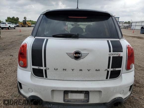 2013 MINI Countryman S ALL4 with VIN WMWZC5C51DWP34357, listed as a Copart auction lot 54945905 with 125,355 mi miles and Salvage title. Bid and sale history available at DreamBid. Image 6.