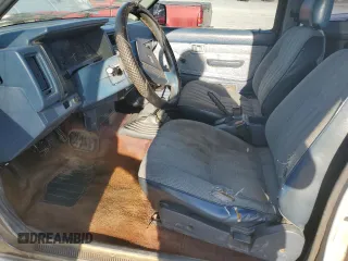 1986 Nissan Hardbody E z VIN 1N6ND16Y0GC394344, wystawiony jako Copart lot #86650524 z przebiegiem 122 949 mil mil oraz Tytuł czysty. Historia ofert i sprzedaży dostępna na DreamBid. Obrazek 7.