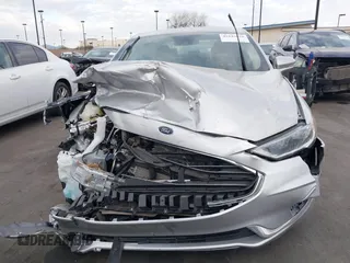 2019 Ford Fusion Hybrid SEL with VIN 3FA6P0MU3KR262056, listed as a IAAI auction lot 41643020 with 1 mi miles. Bid and sale history available at carsss.com. Image 12.