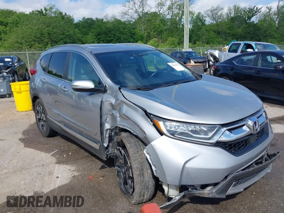 2018 Honda CR-V Touring with VIN 7FARW1H90JE012526, listed as a IAAI auction lot 42055078 with 96,098 mi miles and . Bid and sale history available at DreamBid. Image 1.