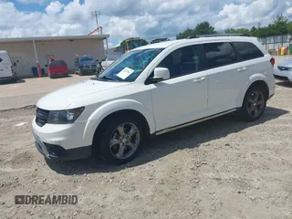 2015 Dodge Journey Crossroad with VIN 3C4PDCGB7FT723142, listed as a IAAI auction lot 42533562 with 217,413 mi miles and . Bid and sale history available at DreamBid. Image 2.