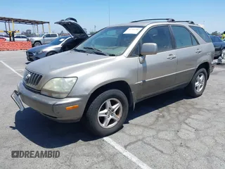 2001 Lexus RX 300 with VIN JTJGF10U210091521, listed as a IAAI auction lot 42761347 with 212,496 mi miles and . Bid and sale history available at DreamBid. Image 2.
