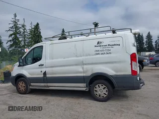 2015 Ford Transit Cargo with VIN 1FTNR1ZM6FKA34609, listed as a IAAI auction lot 42635875 with 214,750 mi miles and . Bid and sale history available at DreamBid. Image 14.