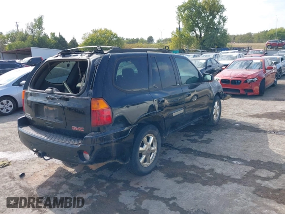 2002 GMC Envoy SLT with VIN 1GKDS13S522214475, listed as a IAAI auction lot 40580711 with 1 mi miles. Bid and sale history available at carsss.com. Image 4.