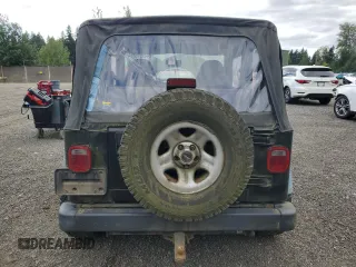 1998 Jeep Wrangler Sport z VIN 1J4FY19S7WP801709, wystawiony jako Copart lot #64495985 z przebiegiem 260 798 mil mil oraz Czysty tytuł • Clean title. Historia ofert i sprzedaży dostępna na DreamBid. Obrazek 6.