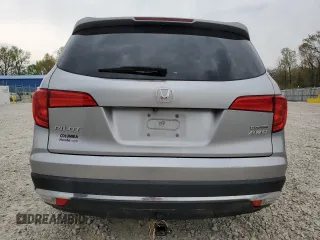 2017 Honda Pilot Touring z VIN 5FNYF6H92HB006855, wystawiony jako Copart lot #53650655 z przebiegiem 130 732 mil mil oraz Szkoda całkowita • Salvage title. Historia ofert i sprzedaży dostępna na DreamBid. Obrazek 6.
