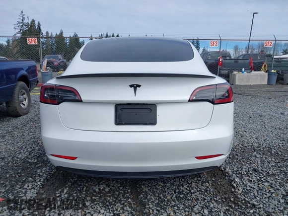 2023 Tesla Model 3 with VIN 5YJ3E1EA2PF612427, listed as a IAAI auction lot 41793756 with 17,913 mi miles and . Bid and sale history available at carsss.com. Image 17.