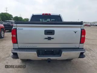 2018 Chevrolet Silverado 1500 LT with VIN 3GCPCREC8JG645232, listed as a IAAI auction lot 41927715 with 95,601 mi miles and . Bid and sale history available at DreamBid. Image 16.