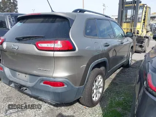 2017 Jeep Cherokee Altitude with VIN 1C4PJLAS7HW617482, listed as a IAAI auction lot 41226235 with 64,708 mi miles and . Bid and sale history available at DreamBid. Image 4.