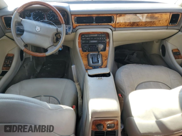 1995 Jaguar XJ with VIN SAJKX1743SC734007, listed as a Copart auction lot 46340825 with 130,115 mi miles and Salvage Title. Bid and sale history available at DreamBid. Image 8.