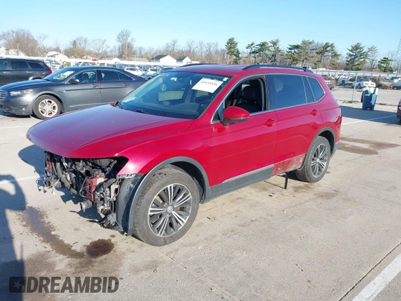 2018 Volkswagen Tiguan SEL z VIN 3VV2B7AX6JM039344, wystawiony jako IAAI lot #41934536 z przebiegiem 93 838 mil mil oraz . Historia ofert i sprzedaży dostępna na DreamBid. Obrazek 19.