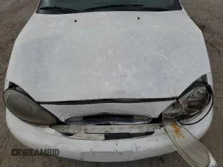 1999 Mercury Sable z VIN 1MEFM58U7XA652331, wystawiony jako Copart lot #49919194 z przebiegiem 143 835 mil mil oraz Szkody całkowita. Historia ofert i sprzedaży dostępna na DreamBid. Obrazek 11.