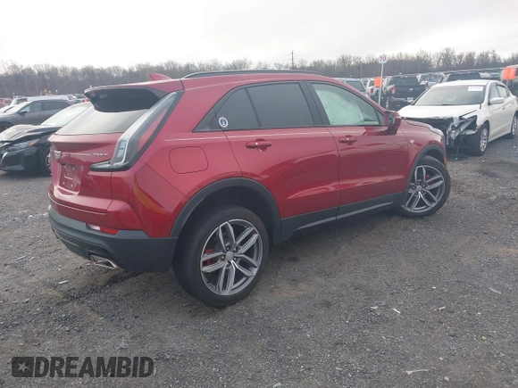 2021 Cadillac XT4 AWD Sport with VIN 1GYFZFR43MF006039, listed as a IAAI auction lot 41845105 with 19,289 mi miles and . Bid and sale history available at DreamBid. Image 4.