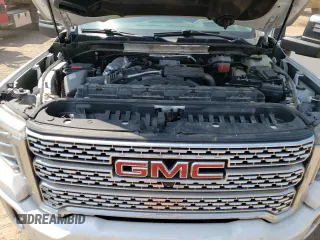 2020 GMC Sierra 3500HD Denali z VIN 1GT49WEY2LF317238, wystawiony jako Copart lot #61554414 z przebiegiem Nie podano mil oraz Szkoda całkowita • Salvage title. Historia ofert i sprzedaży dostępna na DreamBid. Obrazek 11.