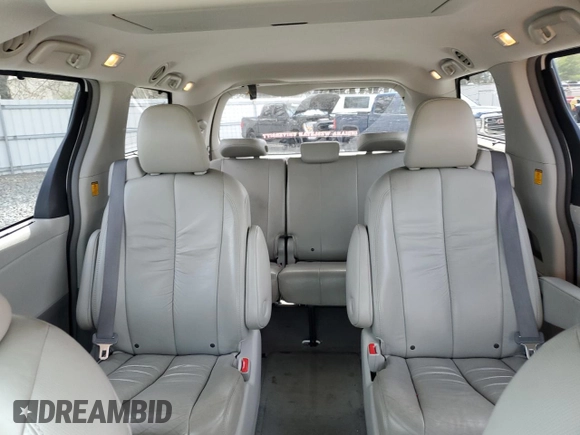 2011 Toyota Sienna XLE with VIN 5TDDK3DC1BS010411, listed as a Copart auction lot 51213065 with 174,214 mi miles and Salvage title. Bid and sale history available at DreamBid. Image 10.