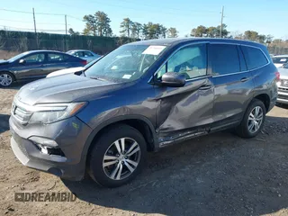 2017 Honda Pilot EX-L with VIN 5FNYF6H59HB101815, listed as a IAAI auction lot 41704661 with 130,479 mi miles and . Bid and sale history available at DreamBid. Image 19.