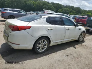 2013 Kia Optima EX z VIN 5XXGN4A72DG237404, wystawiony jako Copart lot #61293445 z przebiegiem 166 327 mil mil oraz Czysty tytuł • Clean title. Historia ofert i sprzedaży dostępna na DreamBid. Obrazek 3.