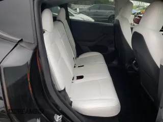 2024 Tesla Model Y с VIN 7SAYGDED4RF045915, выставлен на аукционе Copart как лот 55170415 с пробегом 13 234 миль миль и Списание • Salvage title. История ставок и продаж доступна на DreamBid. Изображение 10.