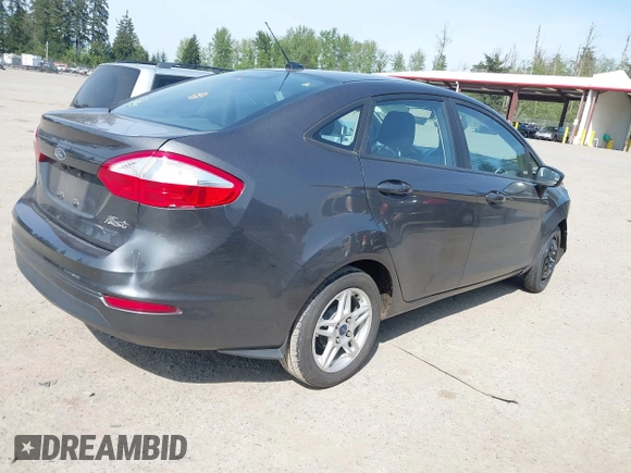 2018 Ford Fiesta SE with VIN 3FADP4BJ2JM101720, listed as a IAAI auction lot 42135936 with 122,061 mi miles. Bid and sale history available at carsss.com. Image 4.