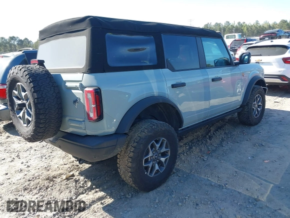 2023 Ford Bronco z VIN 1FMEE5DP7PLB81565, wystawiony jako IAAI lot #41891295 z przebiegiem 27 890 mil mil oraz . Historia ofert i sprzedaży dostępna na DreamBid. Obrazek 4.