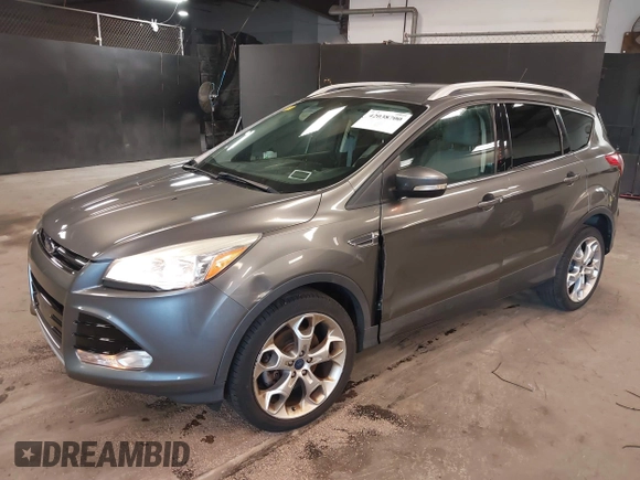 2014 Ford Escape Titanium with VIN 1FMCU9JX0EUE45254, listed as a IAAI auction lot 42038700 with 60,103 mi miles. Bid and sale history available at carsss.com. Image 17.