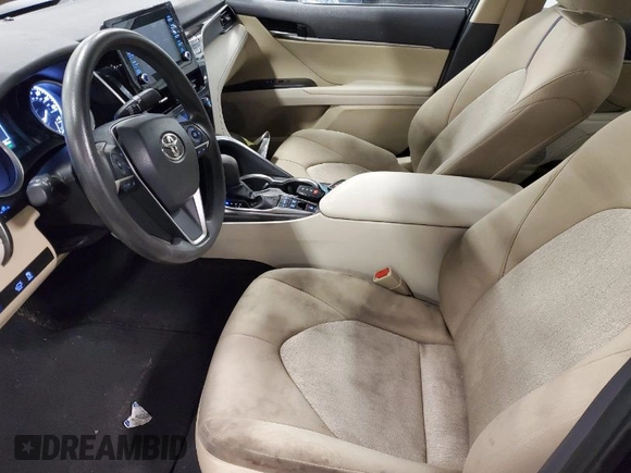 2022 Toyota Camry Hybrid LE with VIN 4T1C31AK4NU580374, listed as a IAAI auction lot 42088131 with 51,949 mi miles. Bid and sale history available at carsss.com. Image 1.