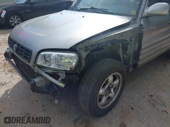 1999 Toyota RAV4 with VIN JT3GP10V5X7042178, listed as a IAAI auction lot 41939833 with 161,818 mi miles and . Bid and sale history available at DreamBid. Image 6.