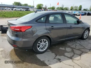 2018 Ford Focus SE z VIN 1FADP3F24JL204488, wystawiony jako Copart lot #54733625 z przebiegiem Nie podano mil oraz Szkoda całkowita • Salvage title. Historia ofert i sprzedaży dostępna na DreamBid. Obrazek 3.