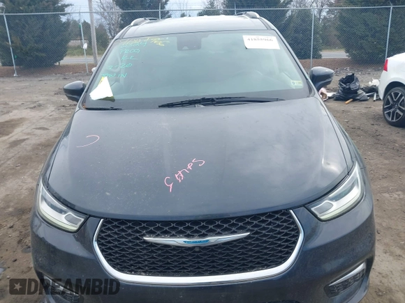 2021 Chrysler Pacifica Hybrid Touring L z VIN 2C4RC1L7XMR593987, wystawiony jako IAAI lot #41855966 z przebiegiem 72 685 mil mil oraz . Historia ofert i sprzedaży dostępna na DreamBid. Obrazek 12.