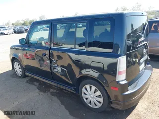 2005 Scion xB with VIN JTLKT334550178997, listed as a IAAI auction lot 41989189 with 163,834 mi miles. Bid and sale history available at carsss.com. Image 3.