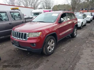 2013 Jeep Grand Cherokee Limited with VIN 1C4RJFBT4DC657211, listed as a IAAI auction lot 41750112 with 175,173 mi miles. Bid and sale history available at carsss.com. Image 2.