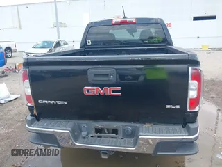 2015 GMC Canyon 2WD SLE with VIN 1GTG5BE3XF1226497, listed as a IAAI auction lot 42106960 with 97,360 mi miles and . Bid and sale history available at carsss.com. Image 17.
