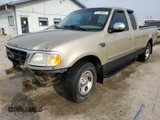 2000 Ford F-150 XL with VIN 2FTRX17W0YCA73568, listed as a Copart auction lot 51128035 with 208,737 mi miles and Salvage Title. Bid and sale history available at carsss.com. Image 1.