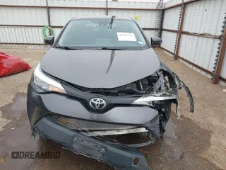 2020 Toyota C-HR LE z VIN JTNKHMBX0L1073916, wystawiony jako IAAI lot #41720784 z przebiegiem 96 730 mil mil oraz . Historia ofert i sprzedaży dostępna na DreamBid. Obrazek 12.