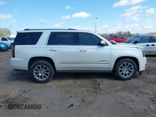 2015 GMC Yukon Denali with VIN 1GKS1CKJ5FR285199, listed as a IAAI auction lot 41763187 with 135,265 mi miles. Bid and sale history available at carsss.com. Image 13.