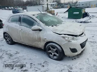 2013 Mazda Mazda2 Sport with VIN JM1DE1KZ2D0165929, listed as a IAAI auction lot 41355449 with 117,873 mi miles. Bid and sale history available at carsss.com. Image 1.