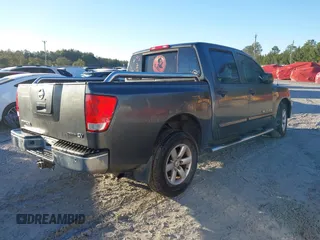 2011 Nissan Titan SV with VIN 1N6BA0ED1BN323008, listed as a IAAI auction lot 41307664 with 161,411 mi miles and . Bid and sale history available at DreamBid. Image 4.