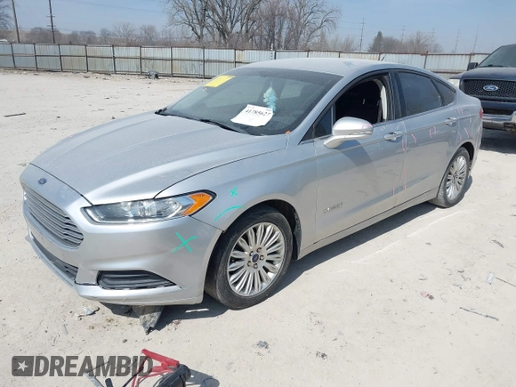 2016 Ford Fusion SE Hybrid with VIN 3FA6P0LU0GR397830, listed as a IAAI auction lot 41785627 with 185,988 mi miles. Bid and sale history available at carsss.com. Image 2.