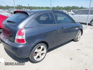 2007 Hyundai Accent SE z VIN KMHCN36C27U050012, wystawiony jako IAAI lot #42112316 z przebiegiem 172 070 mil mil oraz . Historia ofert i sprzedaży dostępna na DreamBid. Obrazek 4.