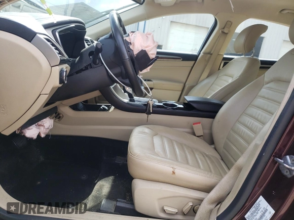 2013 Ford Fusion SE Hybrid z VIN 3FA6P0LU7DR197801, wystawiony jako Copart lot #60468095 z przebiegiem 169 215 mil mil oraz Szkoda całkowita • Salvage title. Historia ofert i sprzedaży dostępna na DreamBid. Obrazek 7.