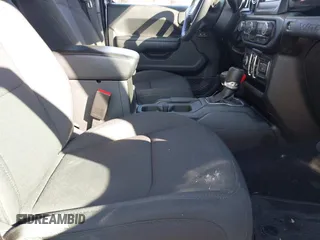 2023 Jeep Wrangler Sport S with VIN 1C4HJXDN6PW617814, listed as a IAAI auction lot 41810646 with 25,095 mi miles and . Bid and sale history available at DreamBid. Image 5.