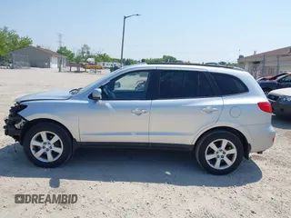 2009 Hyundai Santa Fe SE with VIN 5NMSH73E69H233055, listed as a IAAI auction lot 42454100 with 209,036 mi miles and . Bid and sale history available at DreamBid. Image 15.