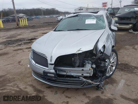 2013 Lincoln MKS EcoBoost with VIN 1LNHL9FT9DG611640, listed as a IAAI auction lot 41131303 with 135,550 mi miles and . Bid and sale history available at DreamBid. Image 17.