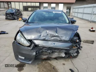 2015 Ford Focus SE z VIN 1FADP3F29FL340350, wystawiony jako Copart lot #53466455 z przebiegiem 146 374 mil mil oraz Szkoda całkowita • Salvage title. Historia ofert i sprzedaży dostępna na DreamBid. Obrazek 5.