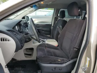 2014 Dodge Grand Caravan SXT z VIN 2C4RDGCG1ER214411, wystawiony jako Copart lot #55497065 z przebiegiem 176 662 mil mil oraz Czysty tytuł • Clean title. Historia ofert i sprzedaży dostępna na DreamBid. Obrazek 7.